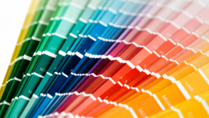 Fan of colour swatches showing a full spectrum of hues used for personal colour analysis